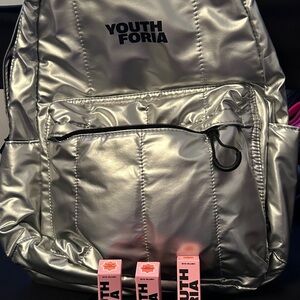 Youth Foria Silver Reflective Backpack with black Accents.  Includes 3 YF Blushe